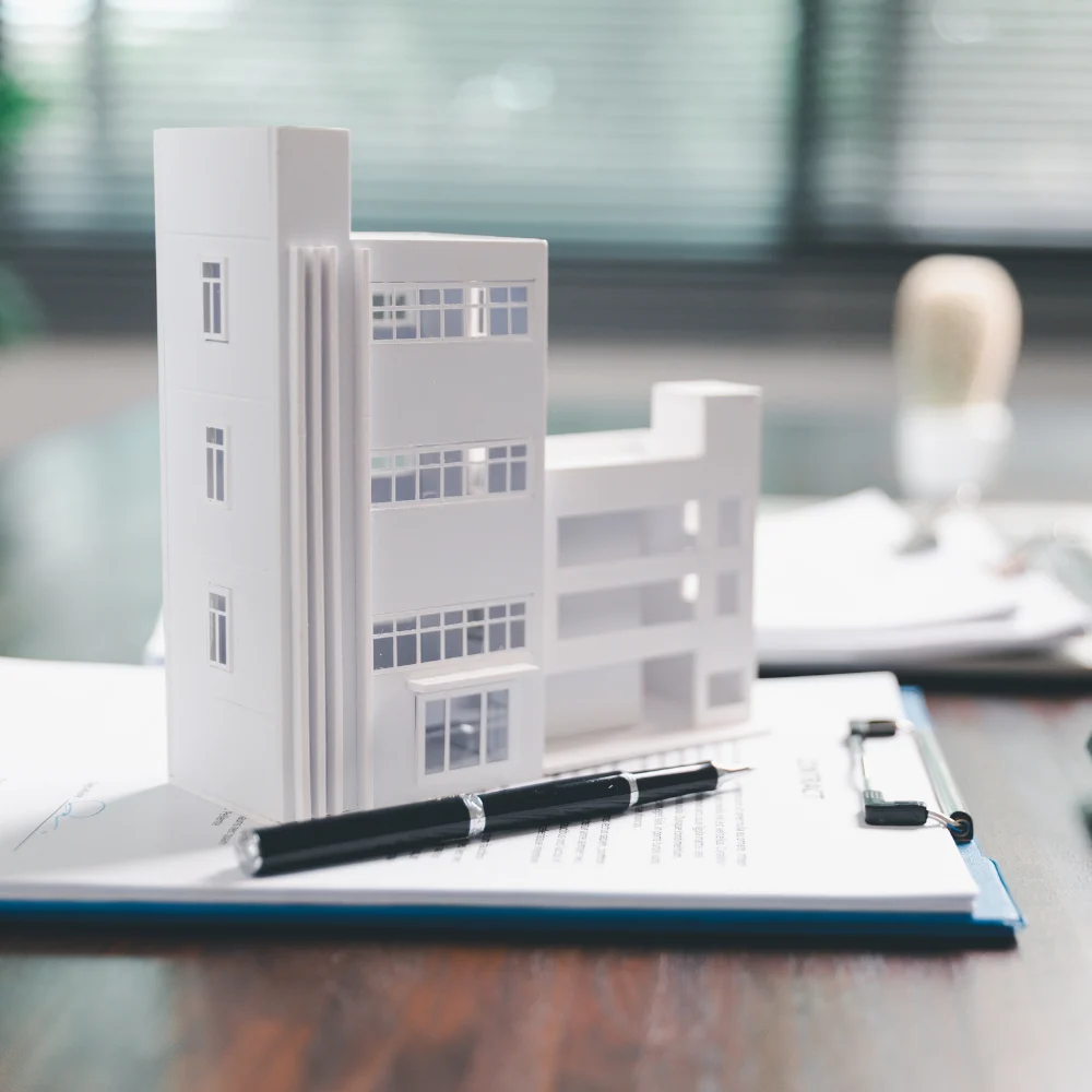 Investor reviewing multiple property models for NNN or STNL acquisition