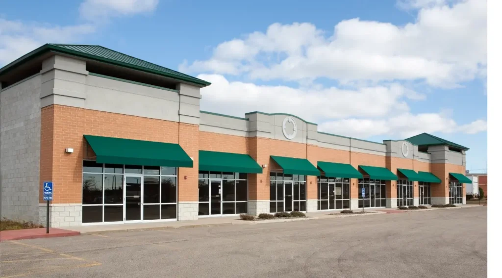 Single-tenant NNN retail property with storefronts, representing passive income and net lease advisory services